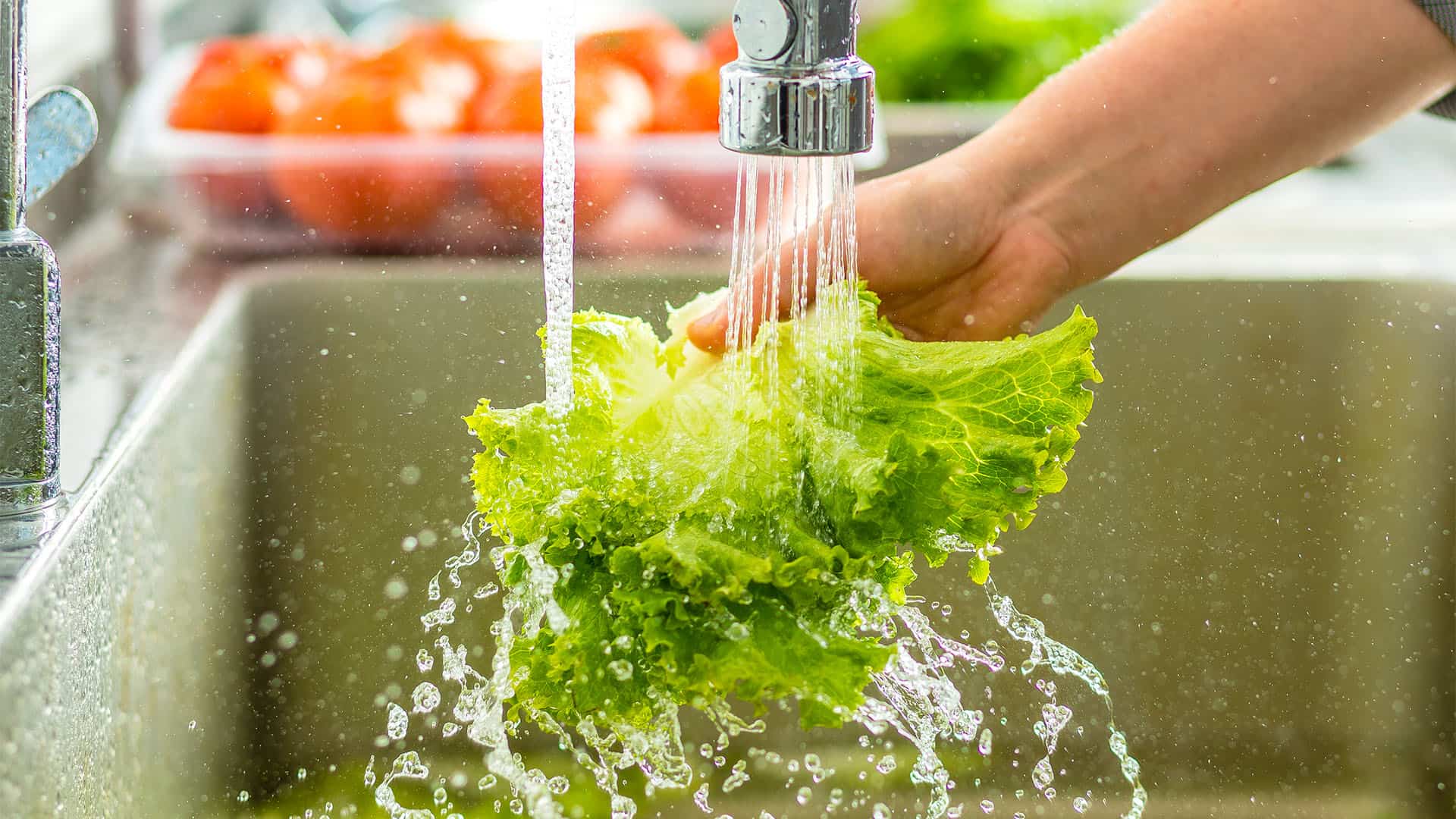 washing salad.