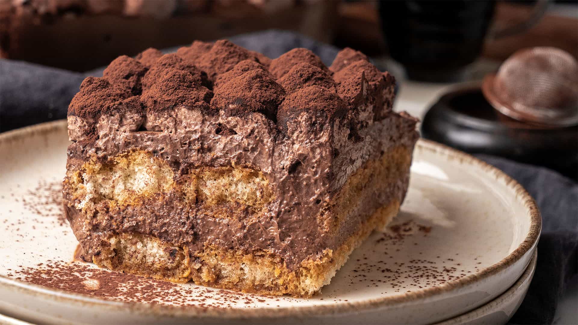 a slice of Chocolate tiramisu on a plate.