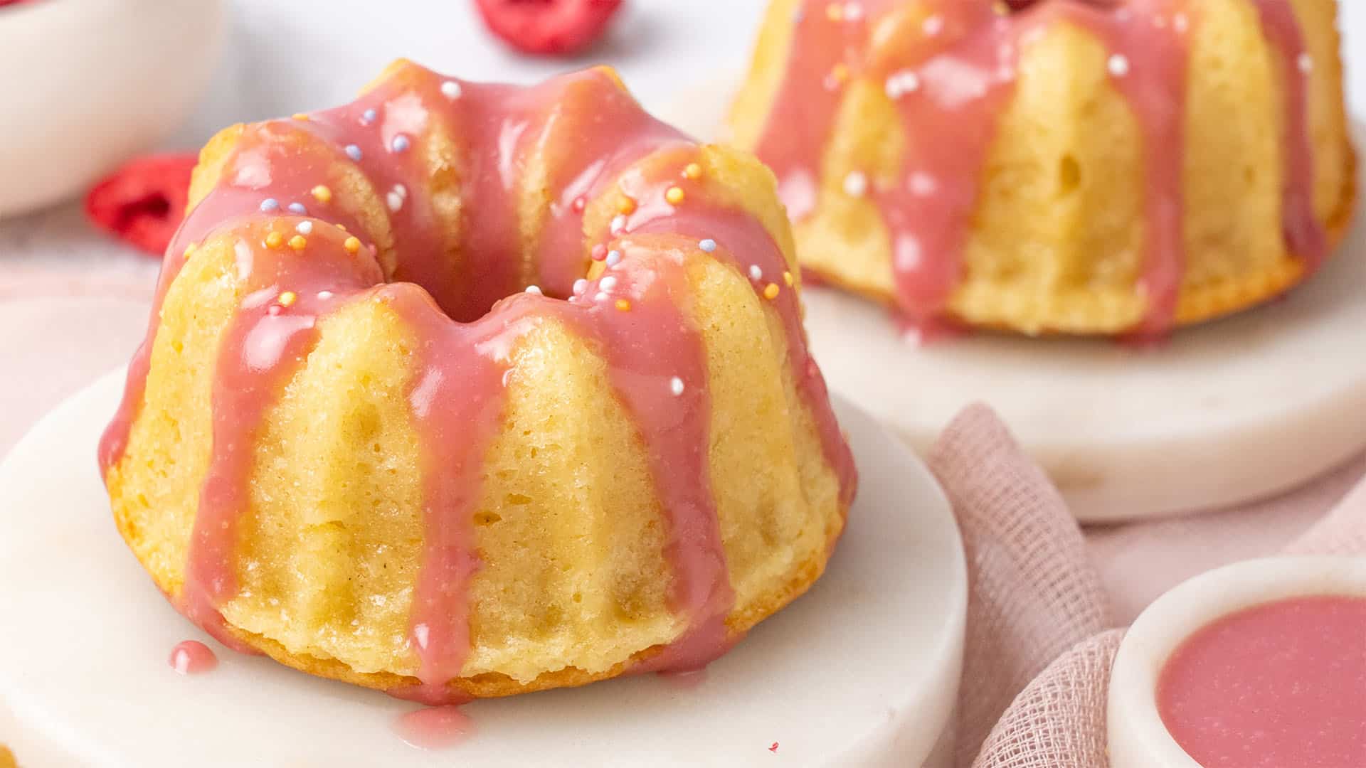 Mini bundt cake on a cake stand.