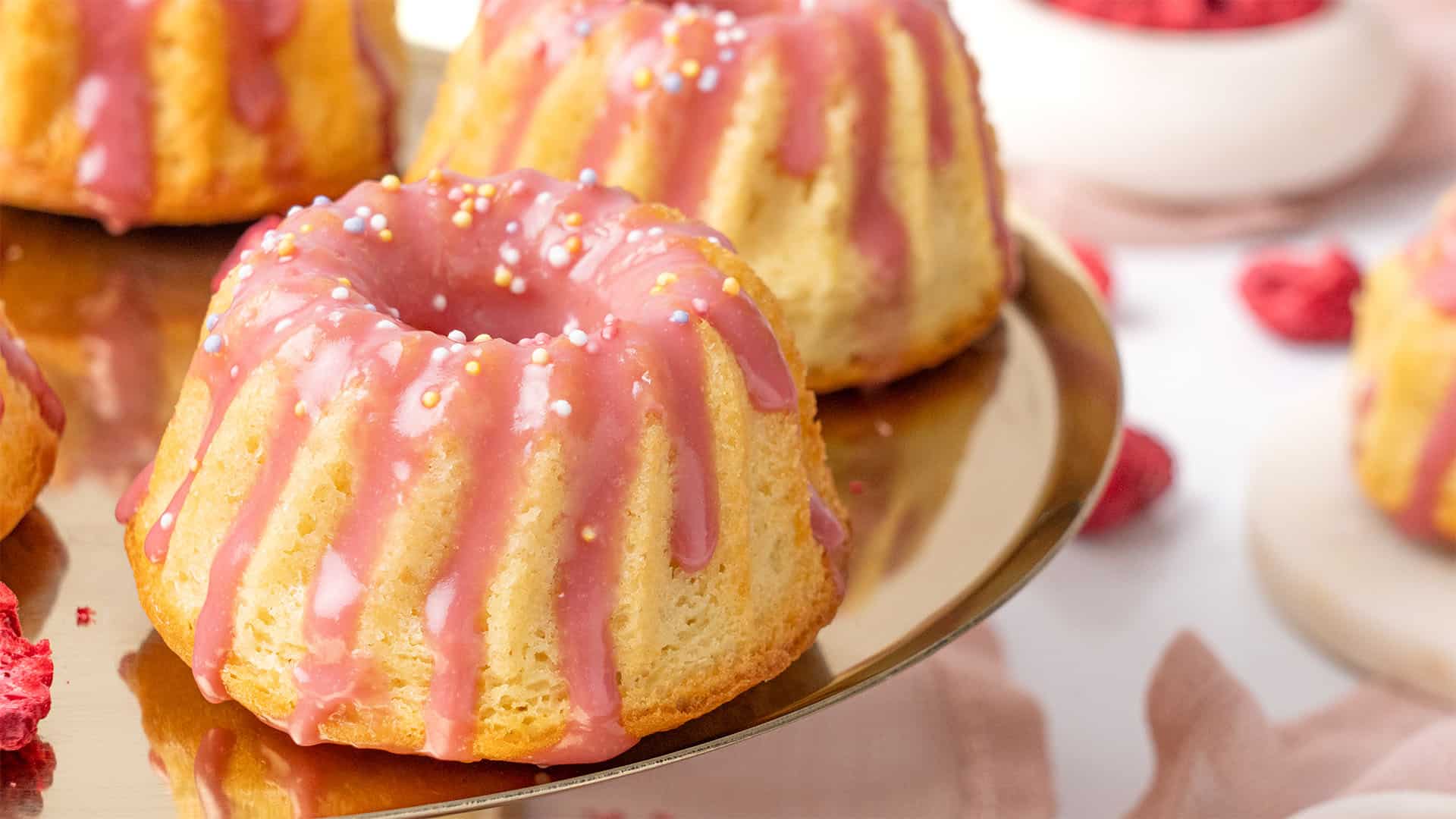 Mini bundt cake on a cake stand.