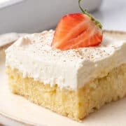 a slice of Tres Leches Cake on a plate.