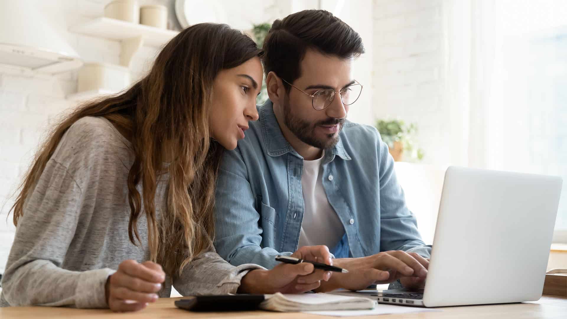 couple with computer laptop.