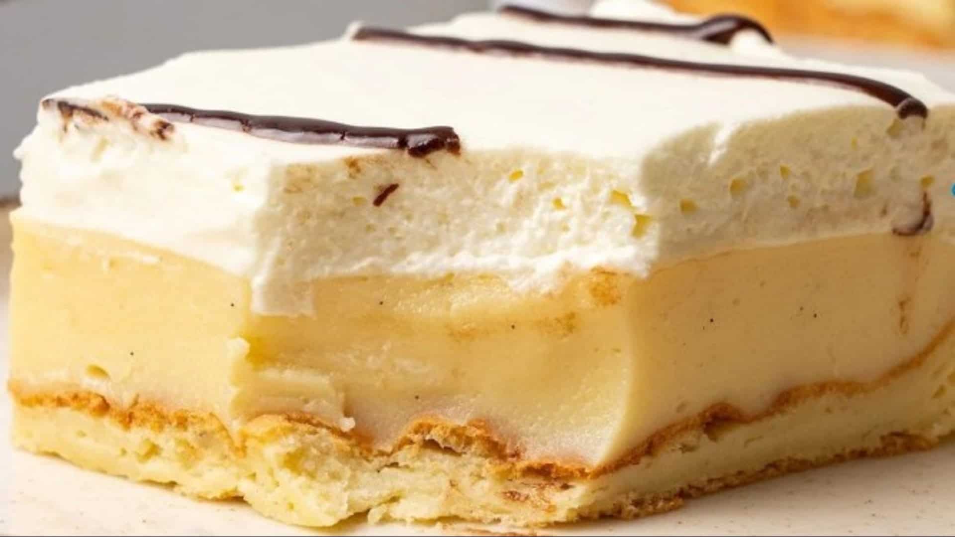 cream puff cake with chocholate drizzle