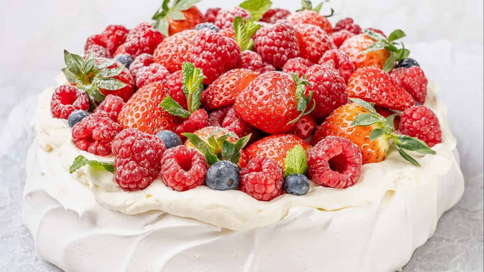 pavlova cake with fresh berries on top