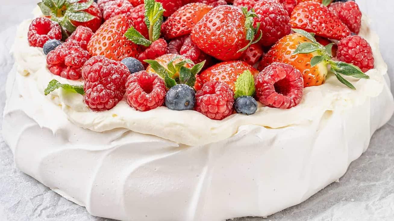pavlova cake with fresh berries on top