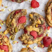 Raspberry Pistachio Cookies on a cooling rack.