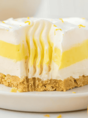 layered lemon lush cheesecake dessert