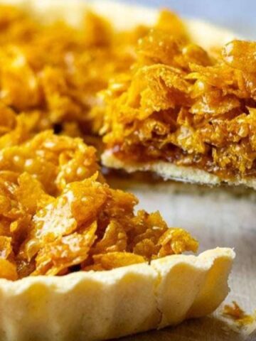 slice of cornflake tart on a spatula