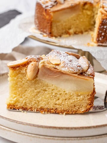 a slice of Pear Almond Cake.