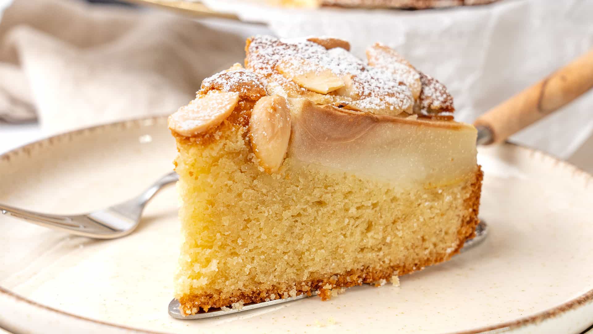 a slice of Pear Almond Cake.