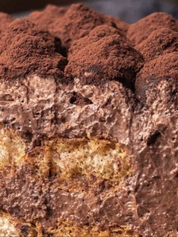 chocolate tiramisu slice with cocoa powder