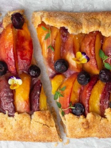 French peach galette with edible flowers