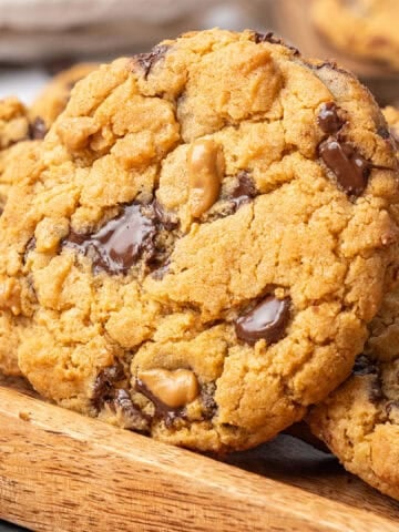 Peanut Butter Chocolate chip Cookies on a cutting board.