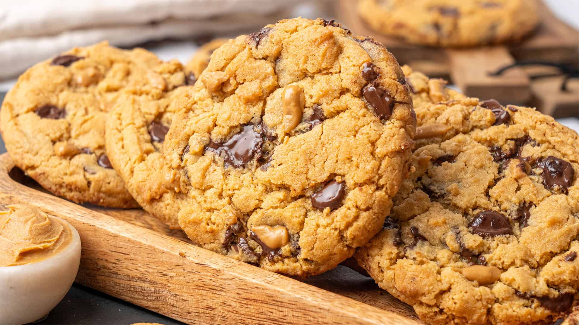 Peanut Butter Chocolate chip Cookies on a cutting board.