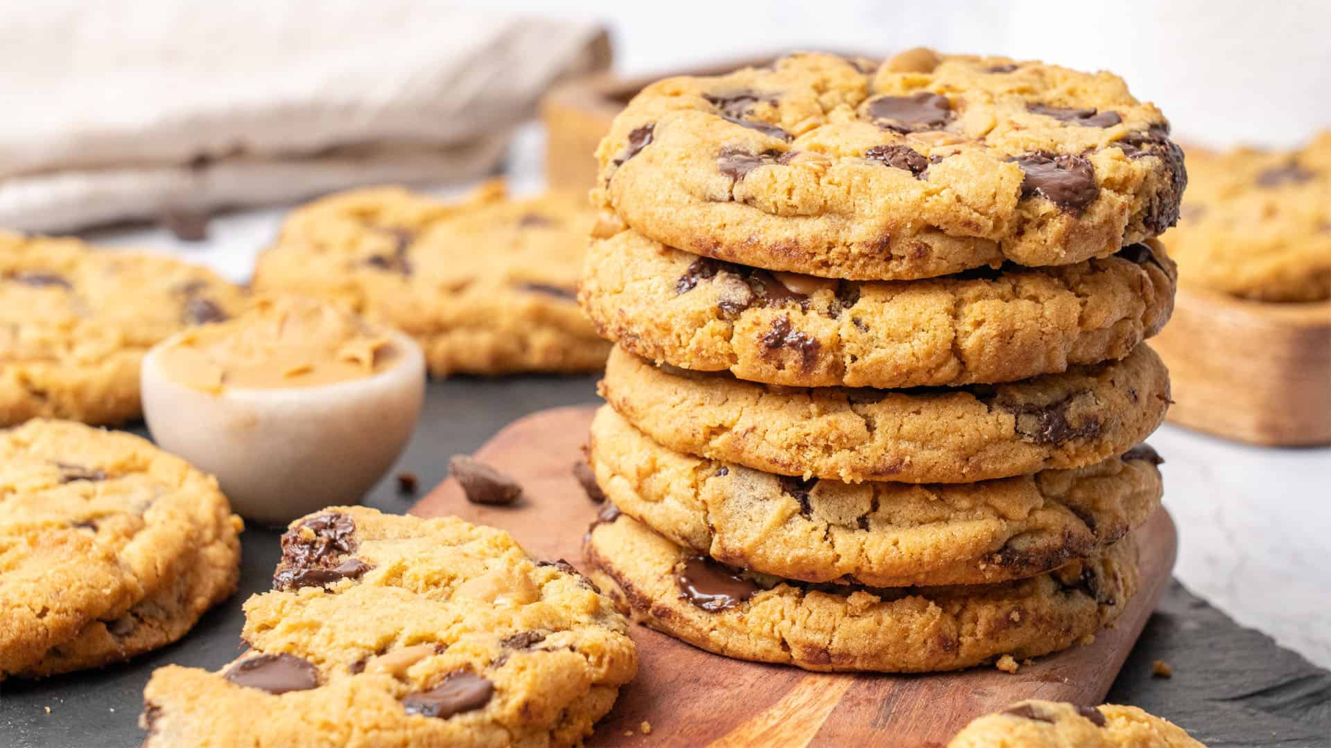 Peanut Butter Chocolate chip Cookies on a cutting board.