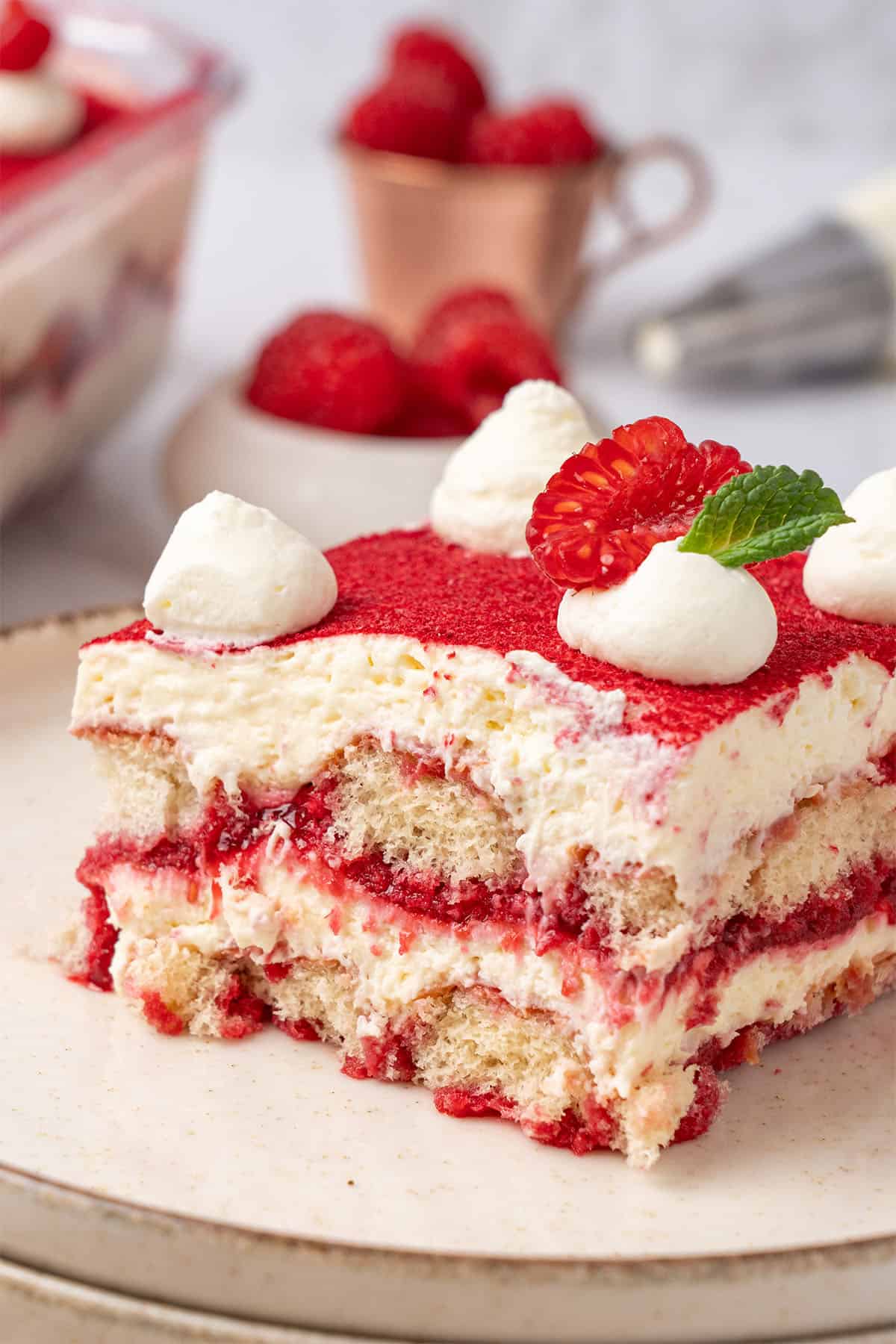 Raspberry tiramisu on a plate.