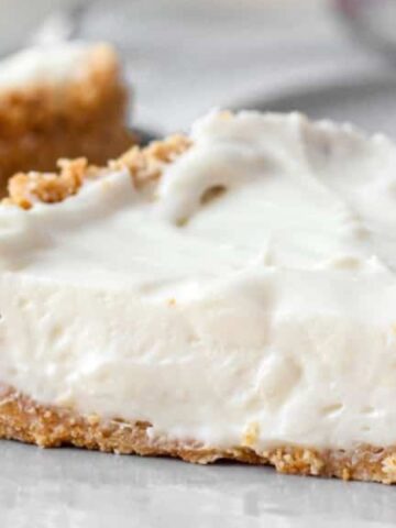 slice of no bake coconut cheesecake