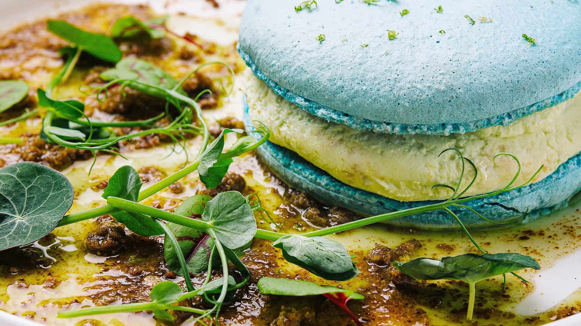 Chicken pate macaron with a light blue shell