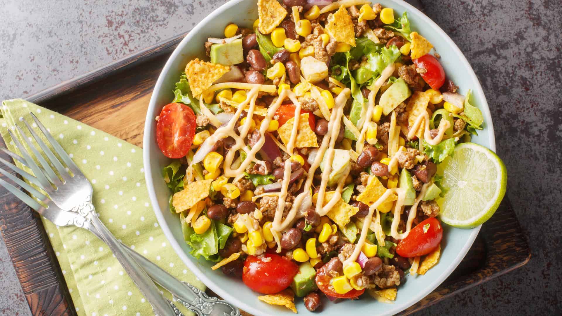 Taco bowl made with tomatoes corn and avocado
