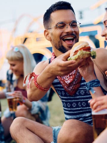 people eating in a festival