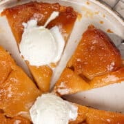 Apple Tarte Tatin on a plate with ice cream.