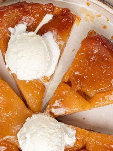 Apple Tarte Tatin on a plate with ice cream.