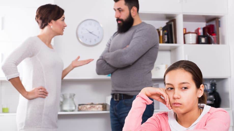 couple arguing while daughter is listening.