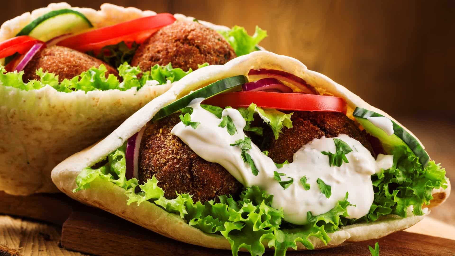 falafel pita wrap with lettuce and tzatziki