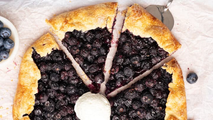 Blueberry galette with a scoop of ice cream.