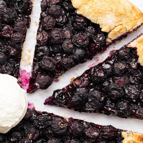 Blueberry galette with a scoop of ice cream.
