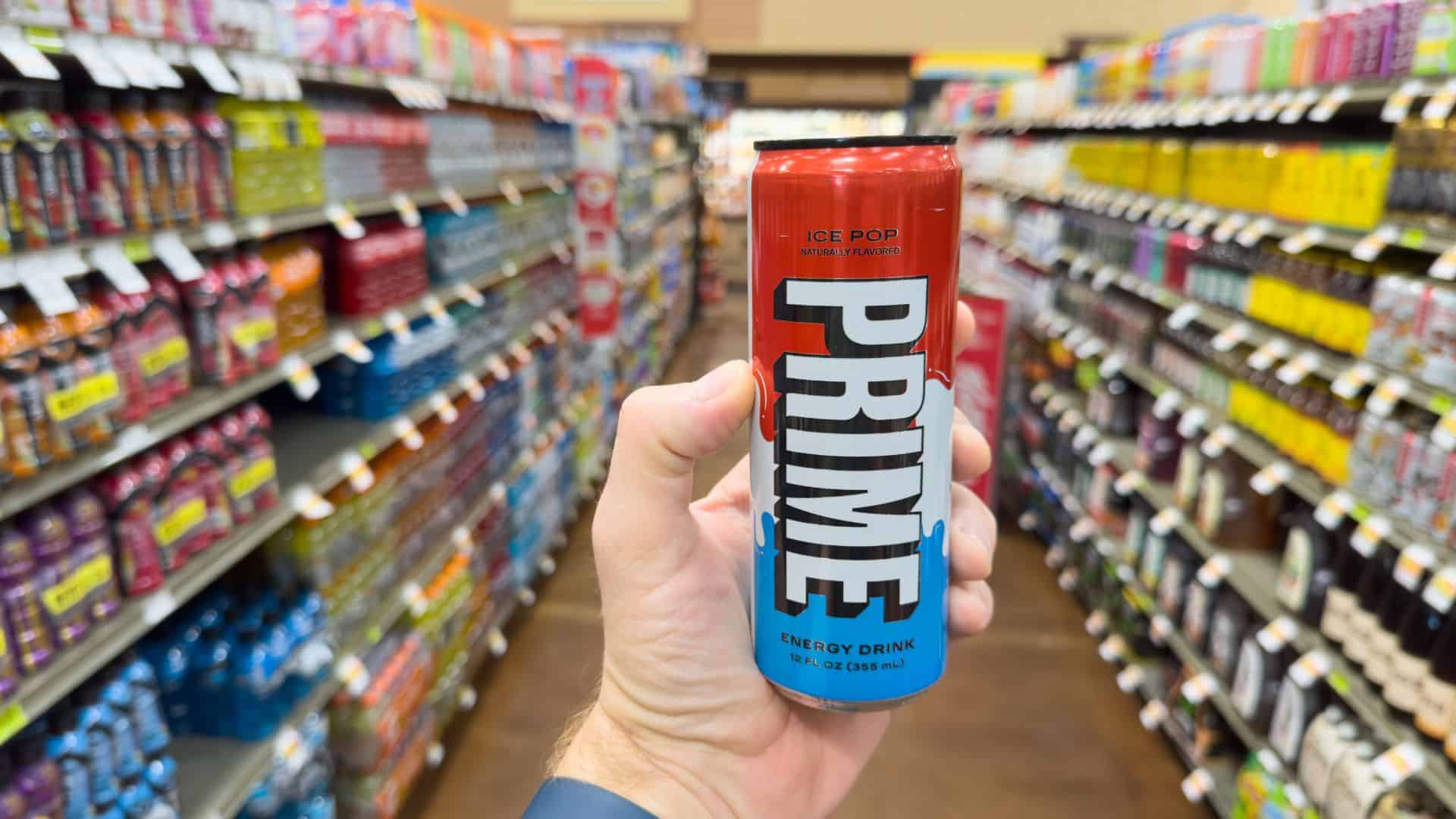 Holding energy drink in hand