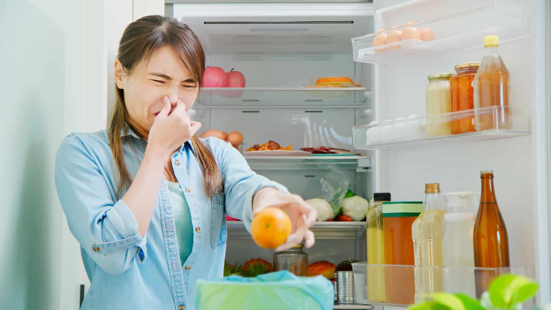 Woman throwing stale food