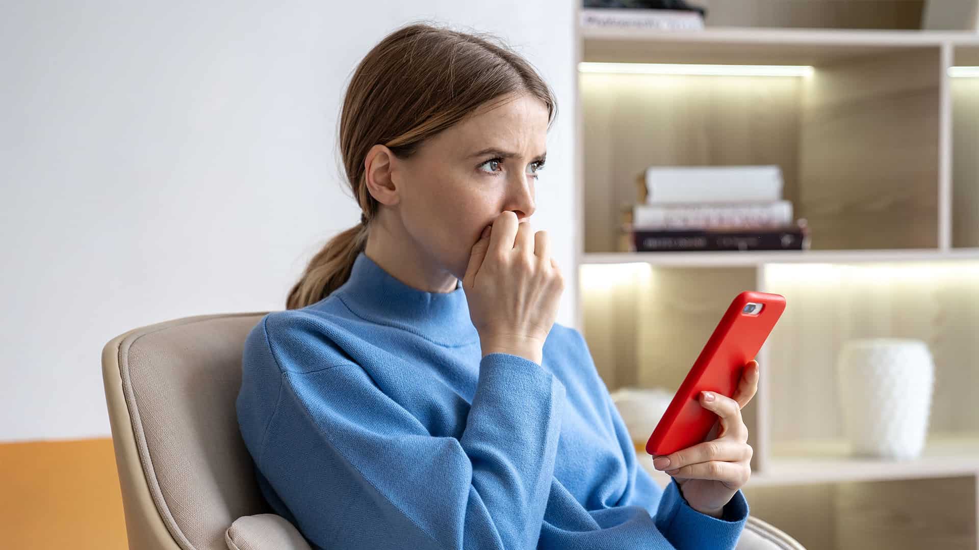 nervous woman on phone.
