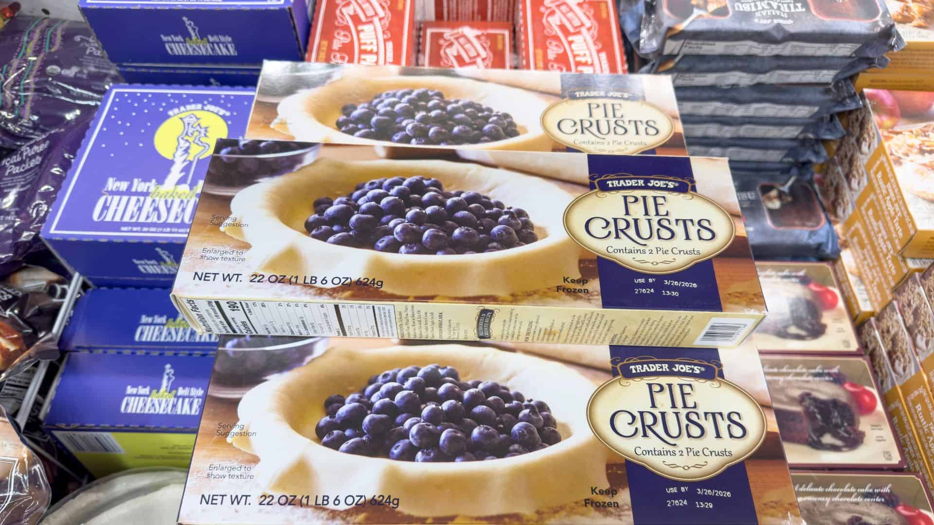 A view of several packages of Trader Joe's pie crusts.