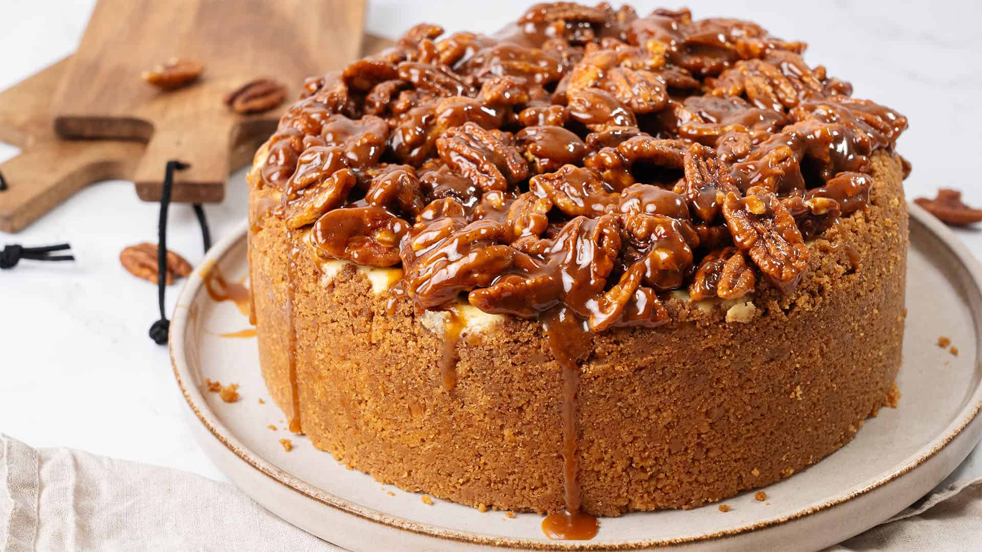 Pecan Pie cheesecake on a plate.