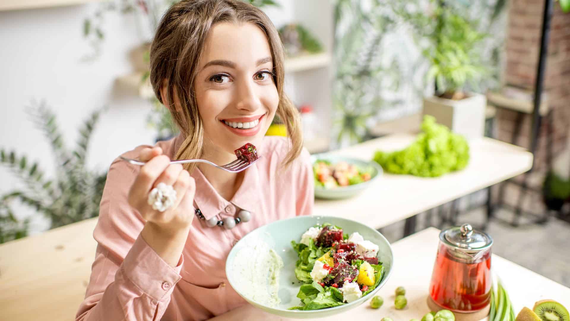woman eating veggies