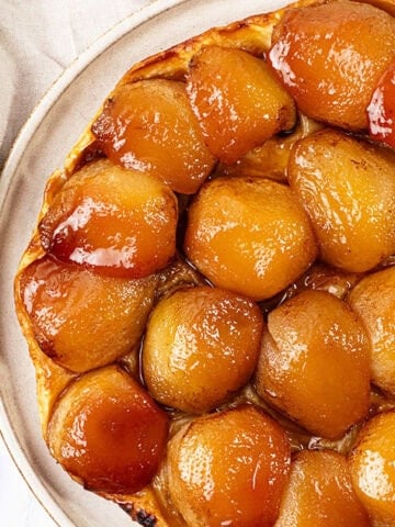 Pear Tarte tatin feature on a plate.