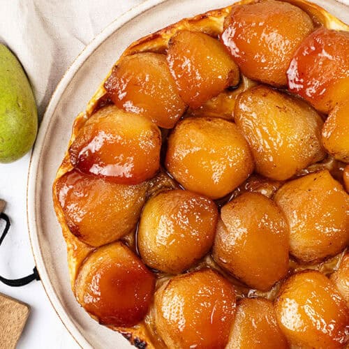 Pear Tarte tatin feature on a plate.