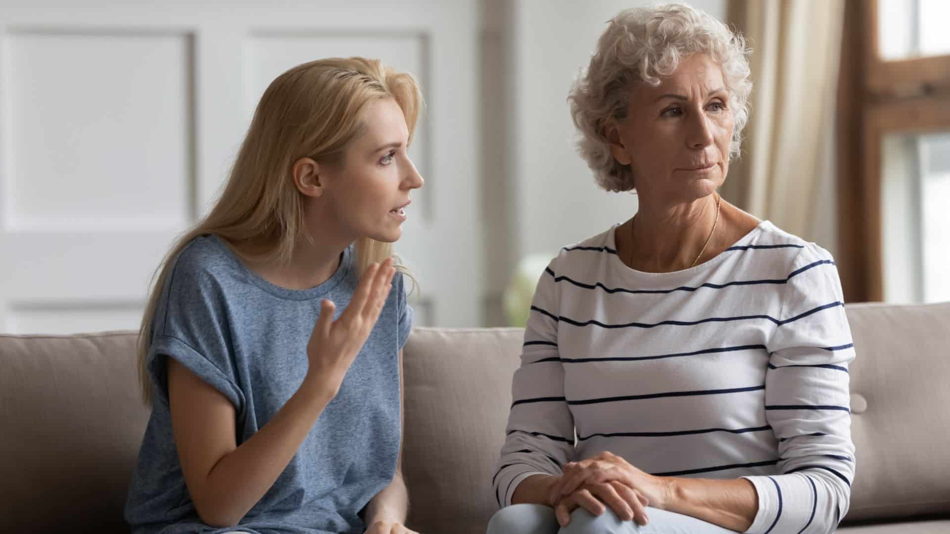 elderly mother and young daughter quarrelling