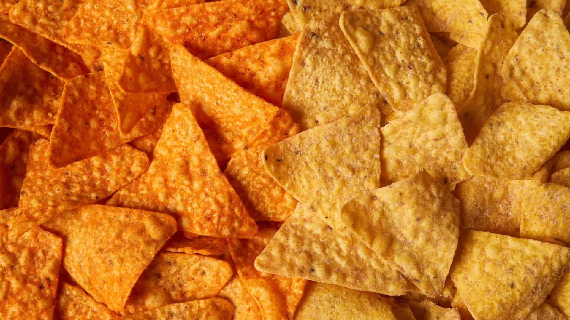 Doritos Nacho cheese pictured next to new Simply NKD Nacho Cheese