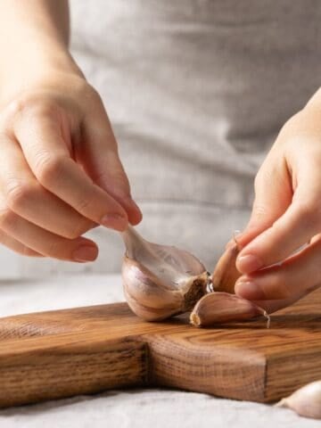 woman holding garlic