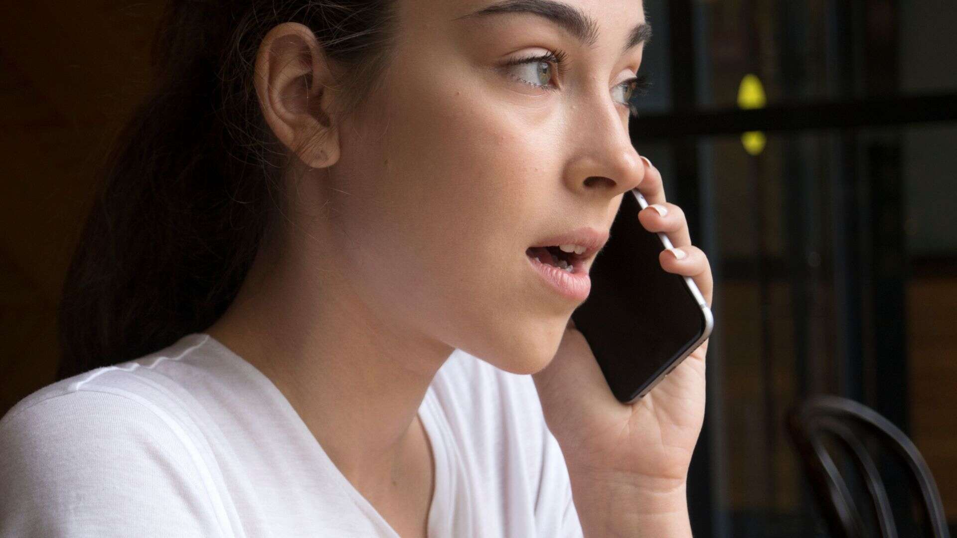 woman talking on phone.