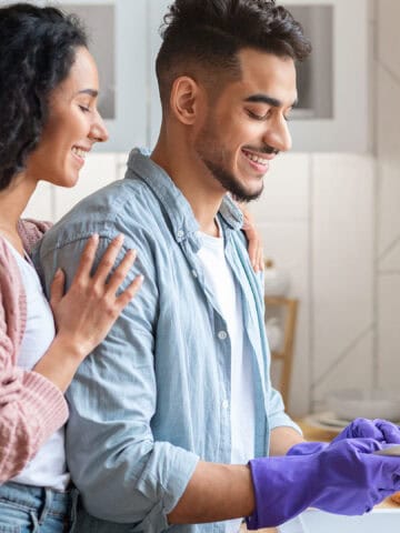 Couple doing dishes.