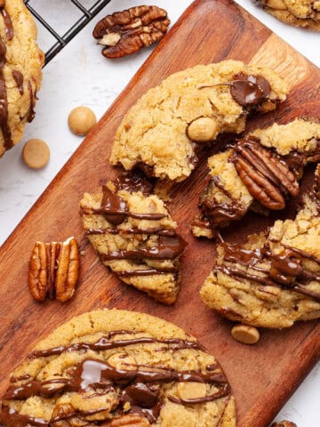 Turtle Cookies on a cutting board.