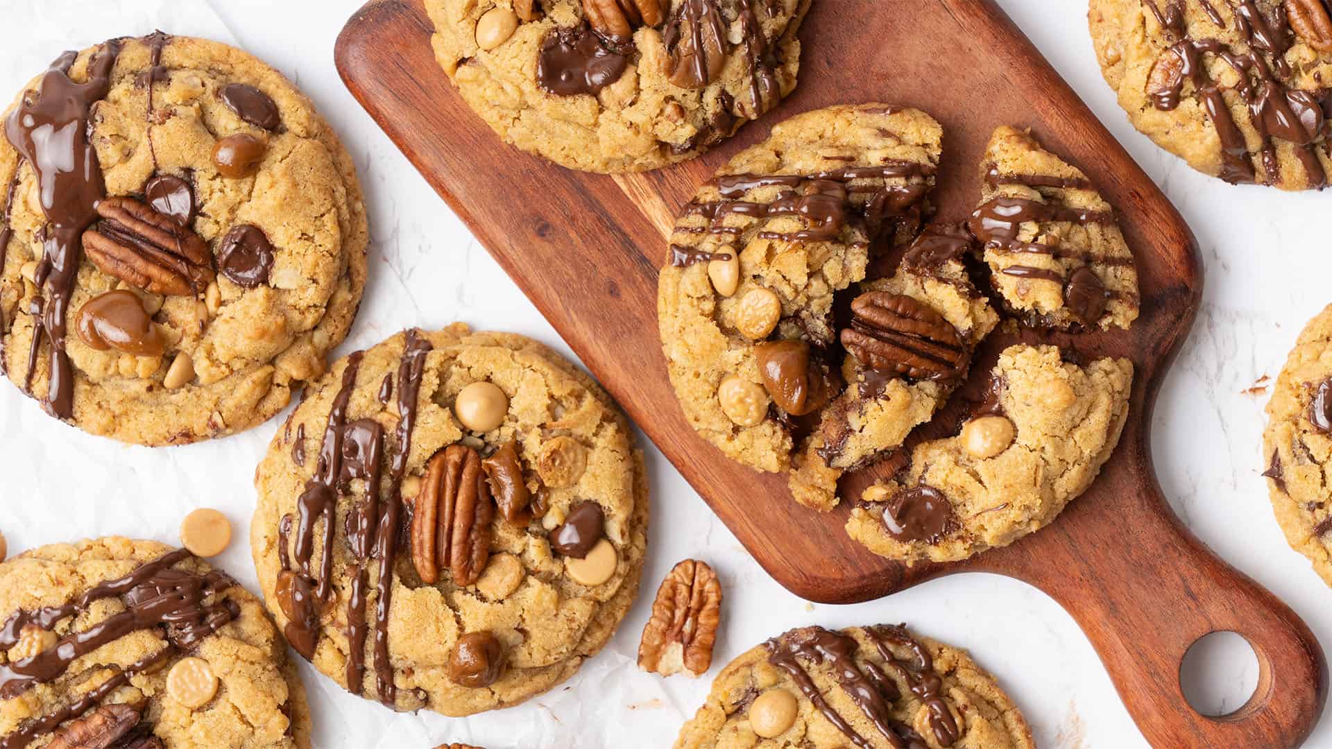 Turtle Cookies on a cutting board.