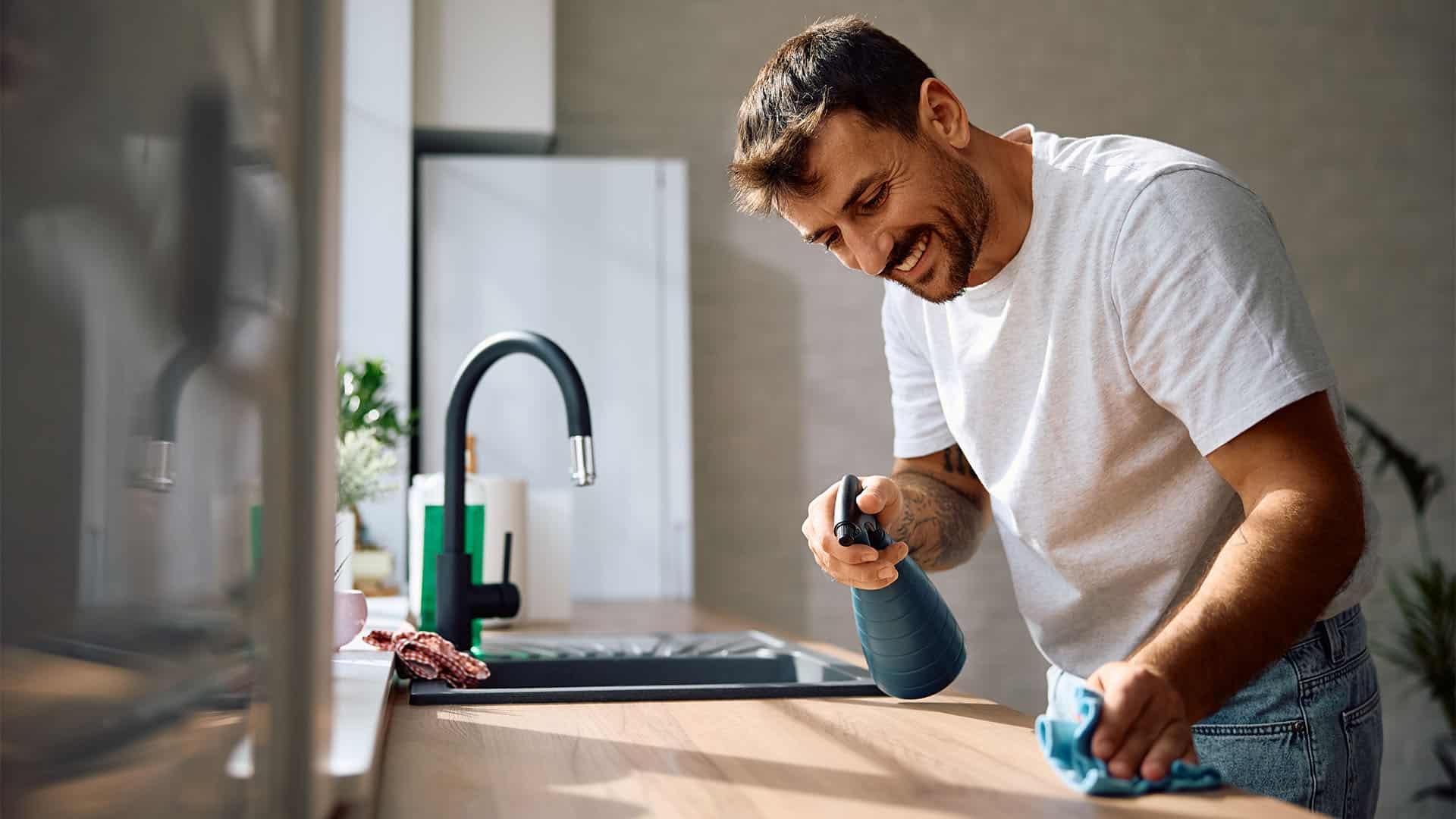 Man cleaning the kitchen.