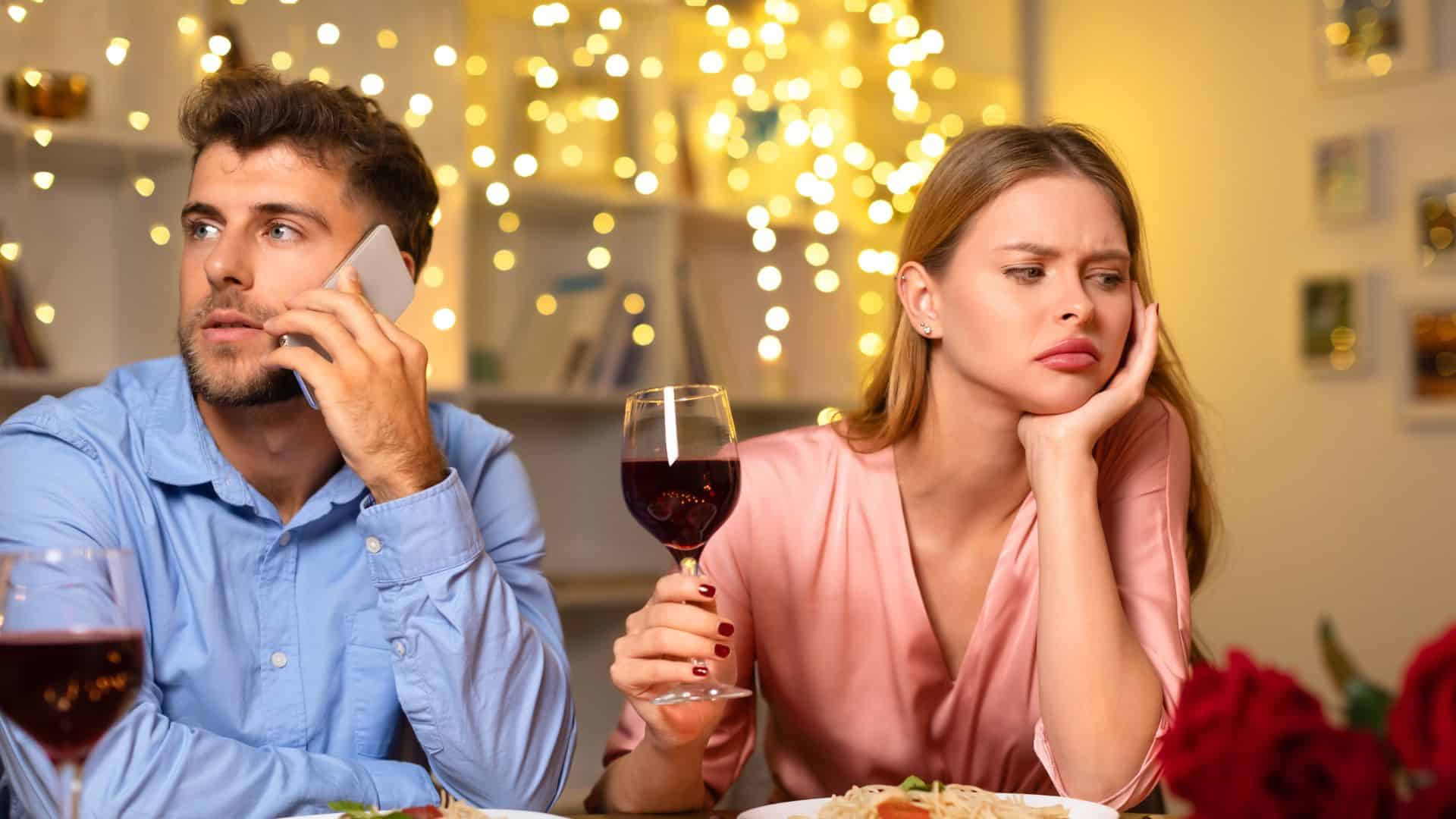 on phone at dinner
