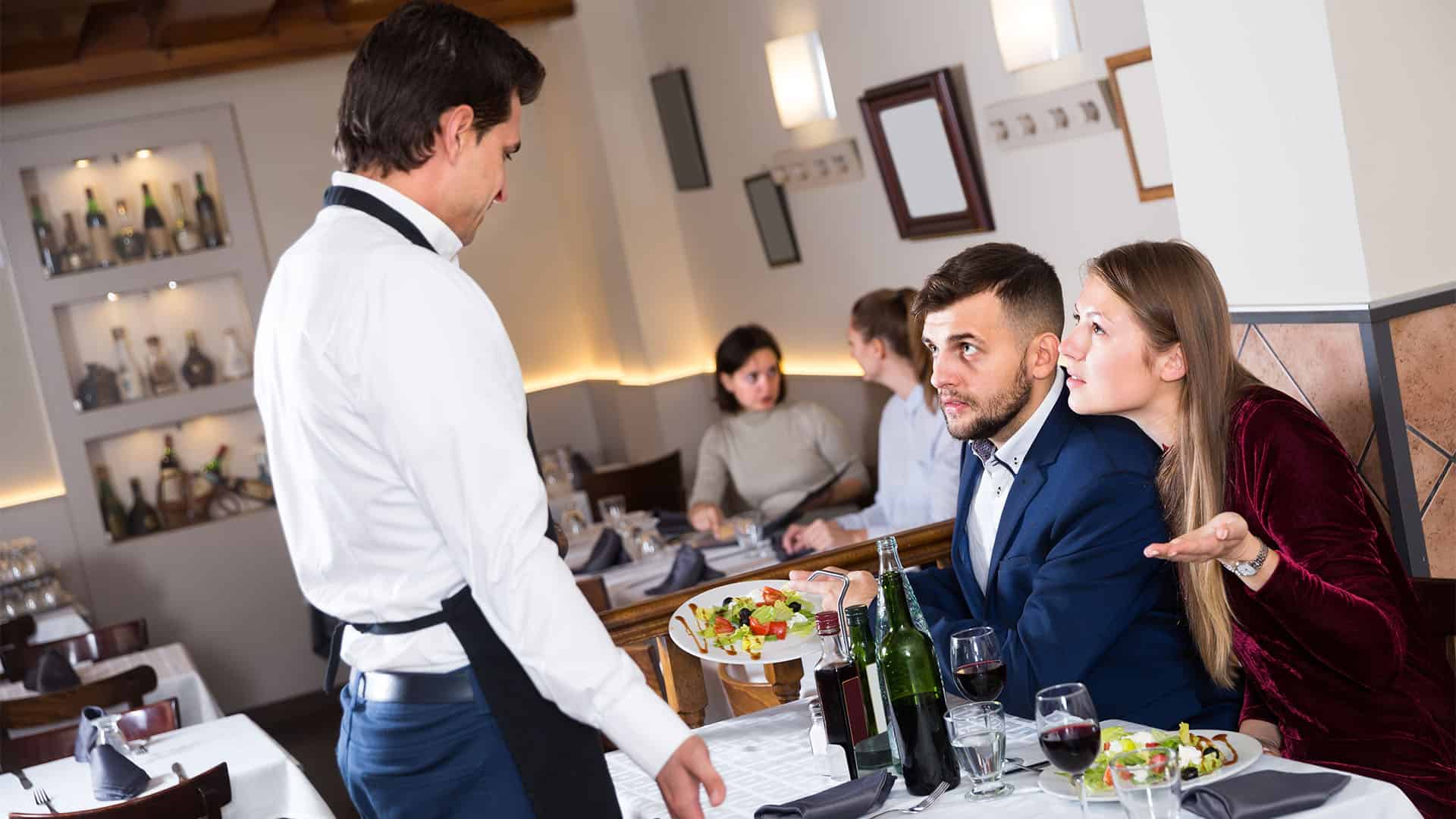 unhappy couple in a restaurant.