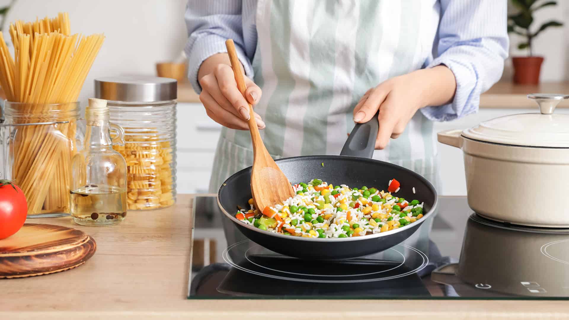 Cooking rice in the kitchen.