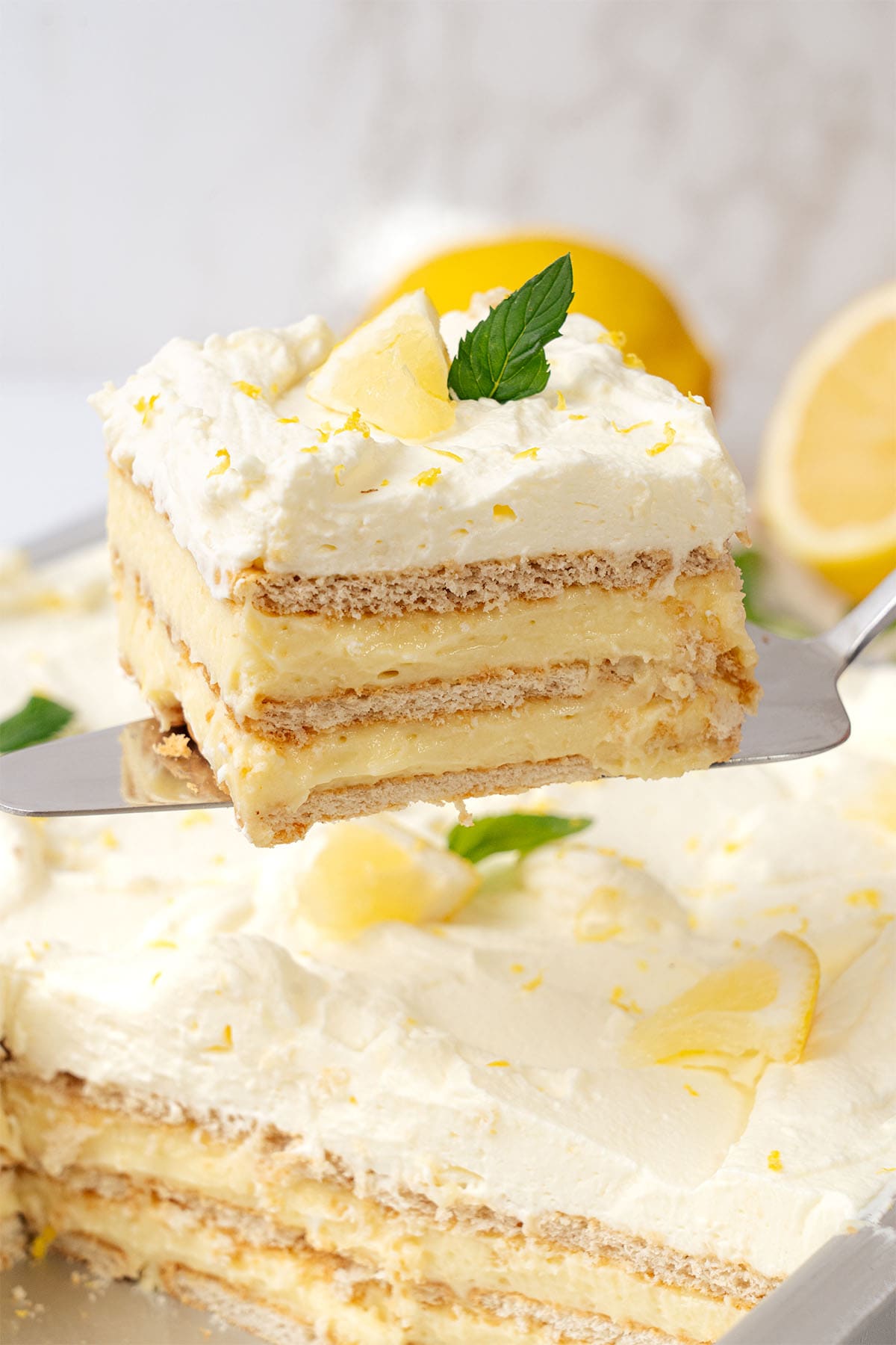 a slice of Lemon Icebox cake on a spoon.